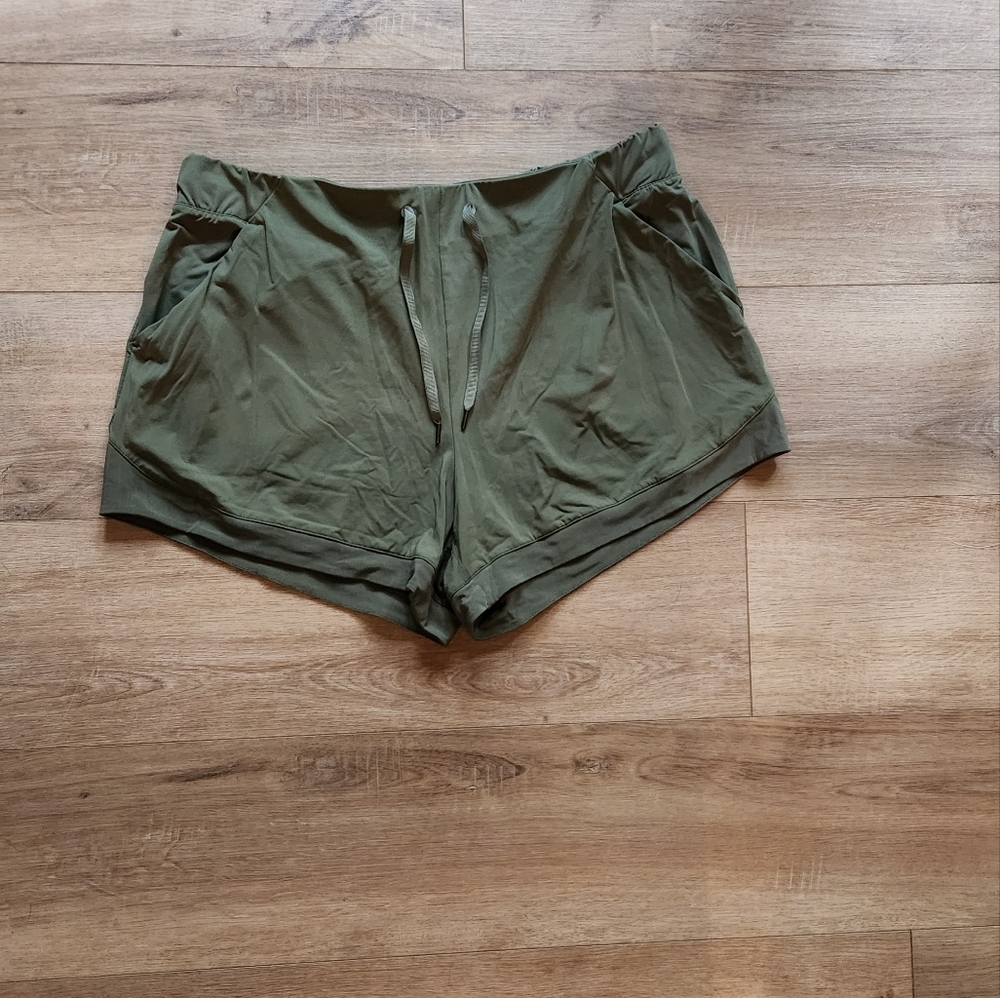 Avia shorts color green size large